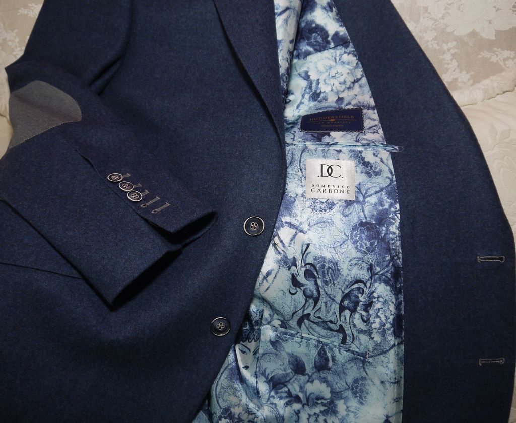 Navy jacket with a blue floral lining