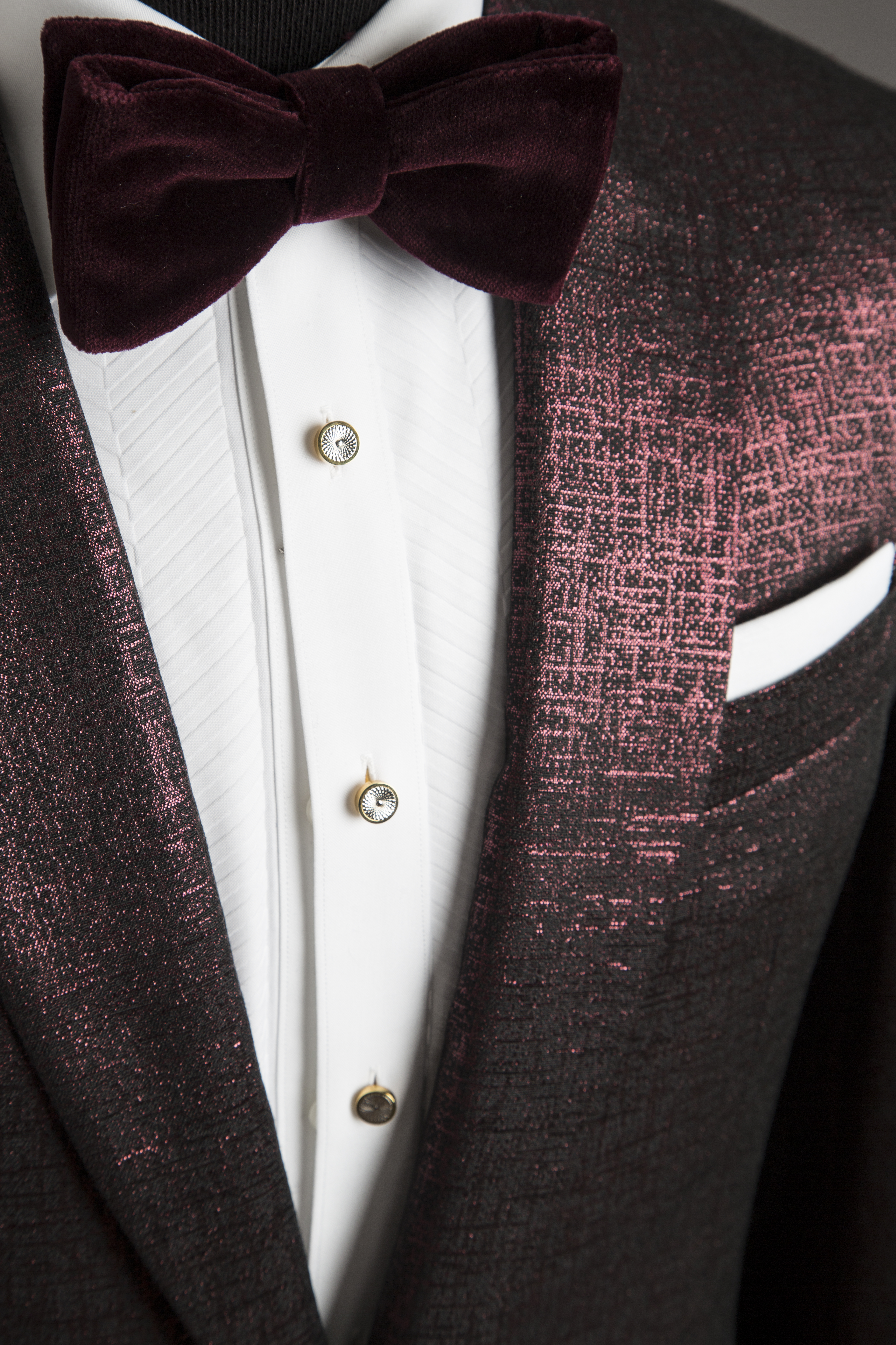 Burgundy metallic dinner jacket with a velvet bow tie