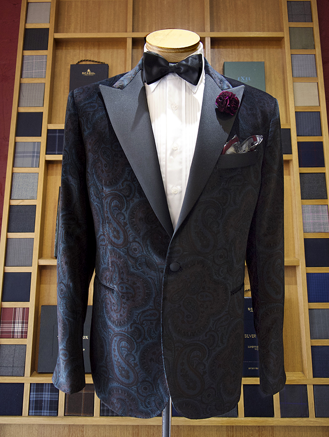 Navy paisley dinner jacket with a boutonni&egrave;re